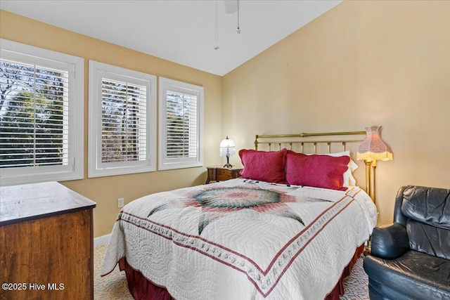 bedroom with lofted ceiling