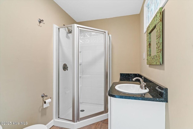 full bathroom with vanity and a stall shower