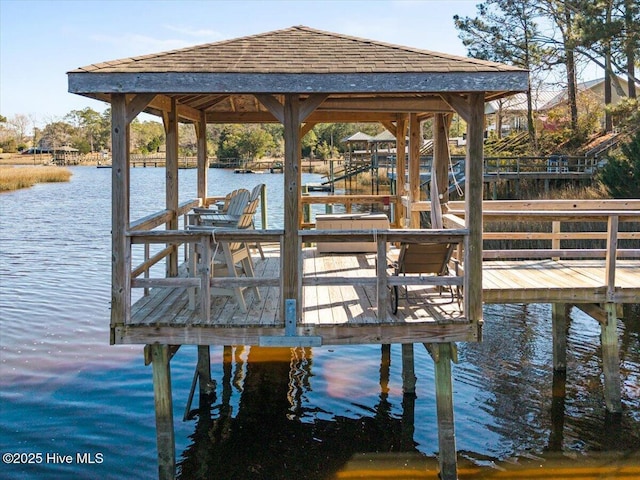 view of dock with a water view