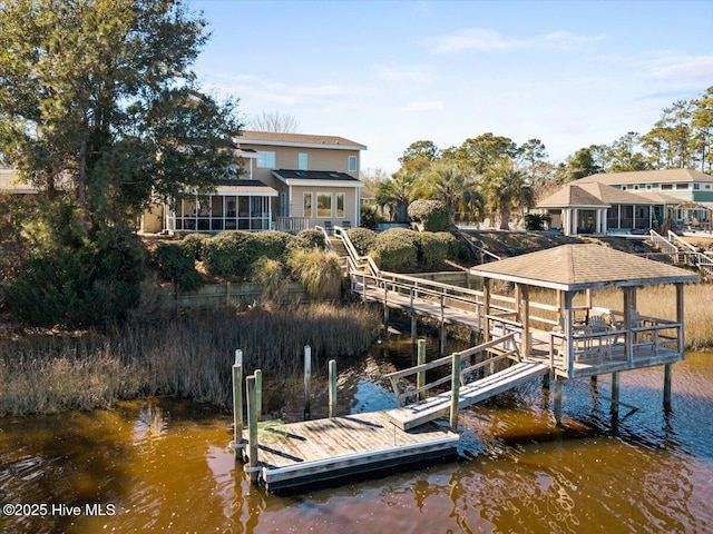 dock area with a water view