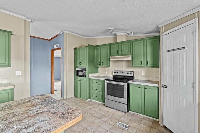 kitchen with green cabinetry, vaulted ceiling, stainless steel electric range, a textured ceiling, and ornamental molding