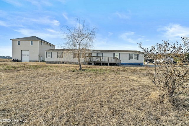 rear view of house with a deck