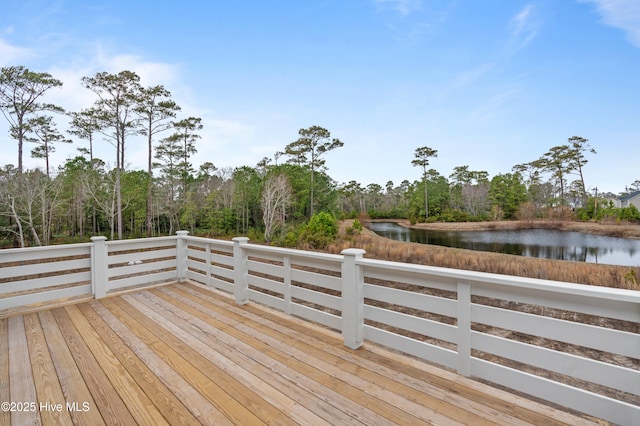 wooden deck with a water view