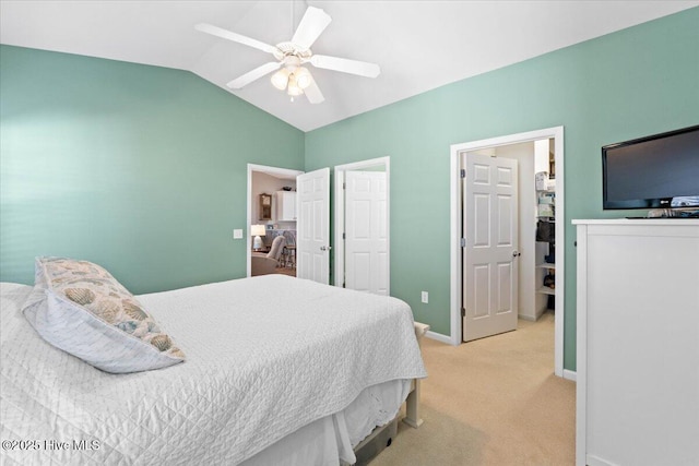 bedroom with lofted ceiling, light colored carpet, and ceiling fan