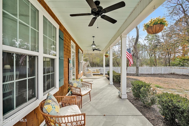 view of patio featuring ceiling fan