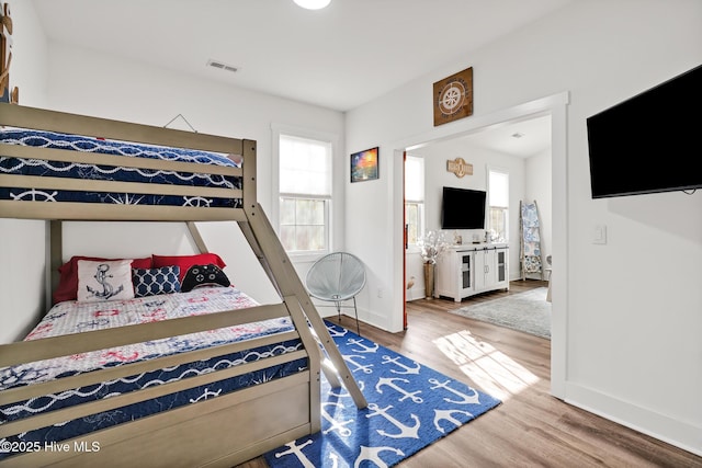 bedroom featuring hardwood / wood-style flooring