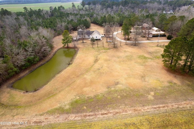 birds eye view of property with a rural view and a water view