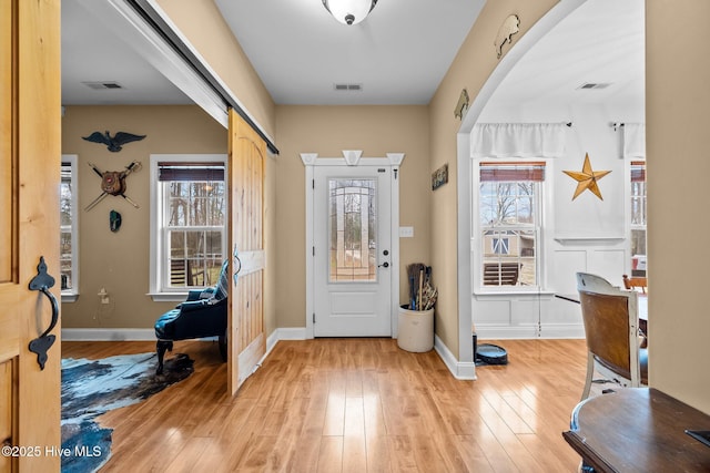 entryway featuring a healthy amount of sunlight and light wood-type flooring