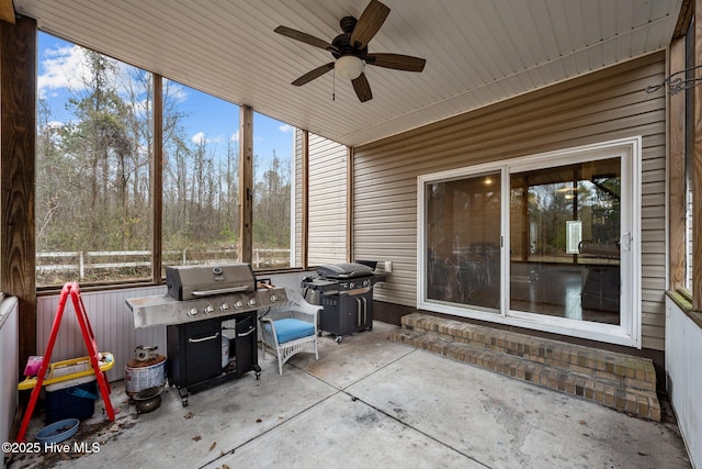 exterior space featuring ceiling fan