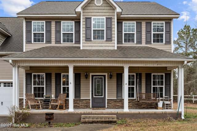 craftsman inspired home featuring covered porch