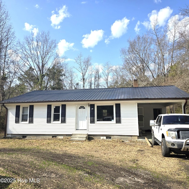 single story home featuring a carport