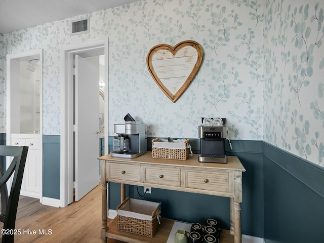 bathroom with wood-type flooring and vanity