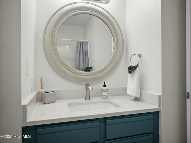 bathroom with vanity and walk in shower