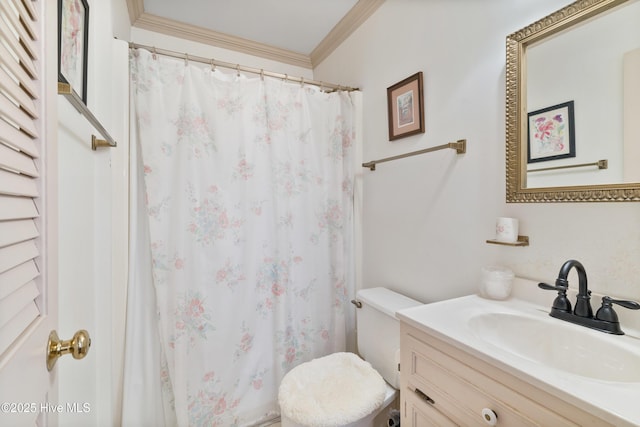 bathroom with vanity, crown molding, toilet, and a shower with shower curtain