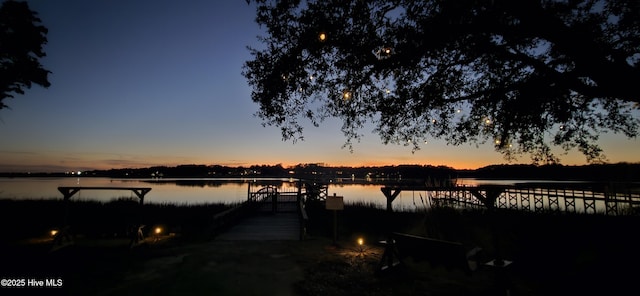 view of water feature with a dock