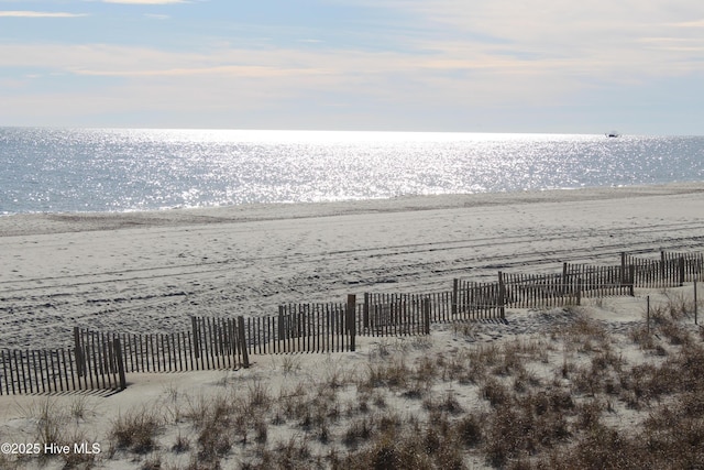 property view of water featuring a view of the beach