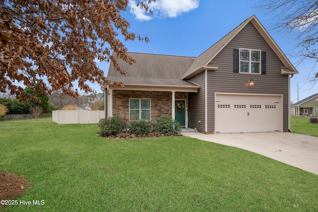 front facade featuring a garage and a front yard