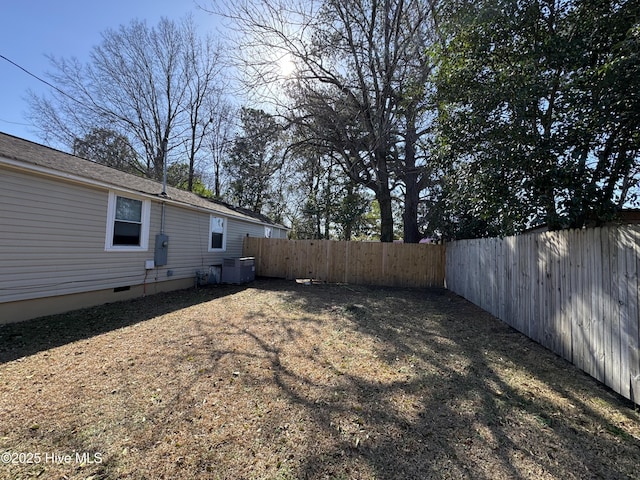 view of yard featuring central AC