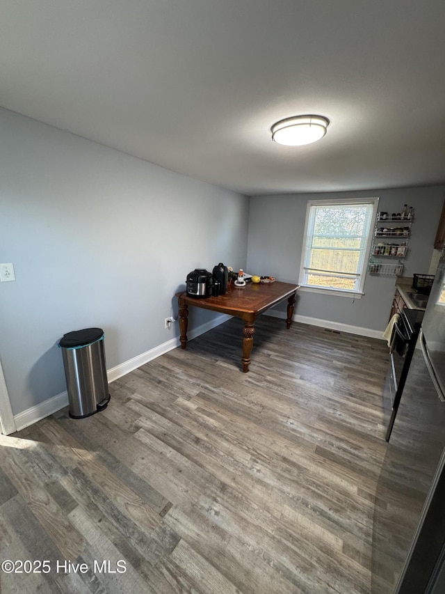 interior space with dark hardwood / wood-style flooring