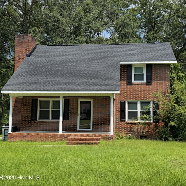 view of front facade featuring a front yard