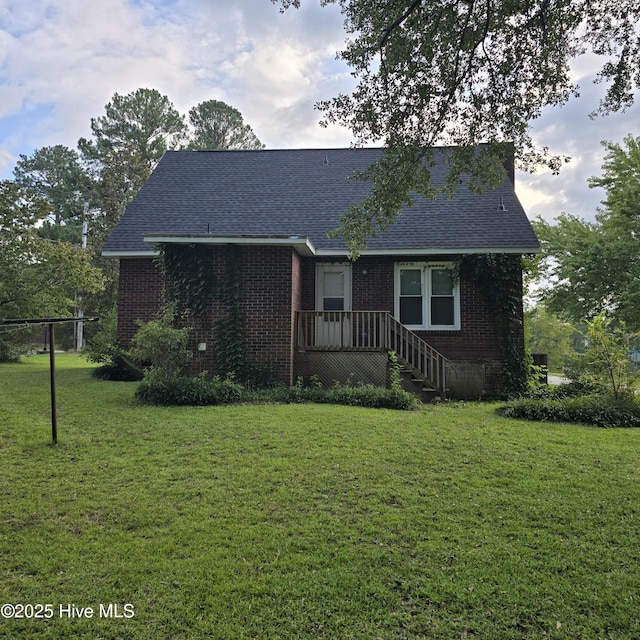 view of front of home with a front yard