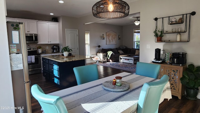 dining room featuring dark hardwood / wood-style floors