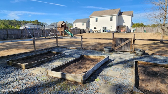 view of yard with a playground