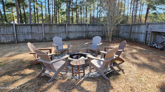 view of yard with a fire pit