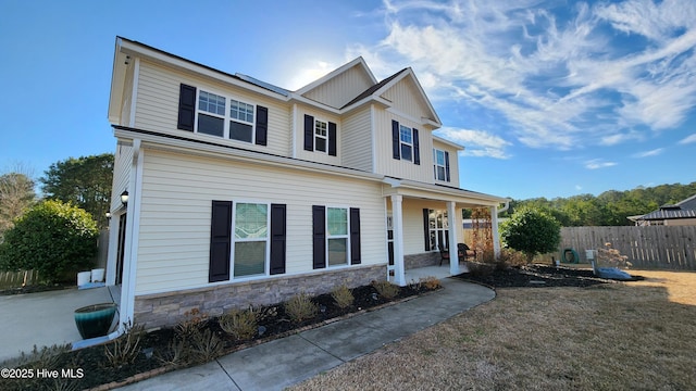 view of front facade featuring a front yard