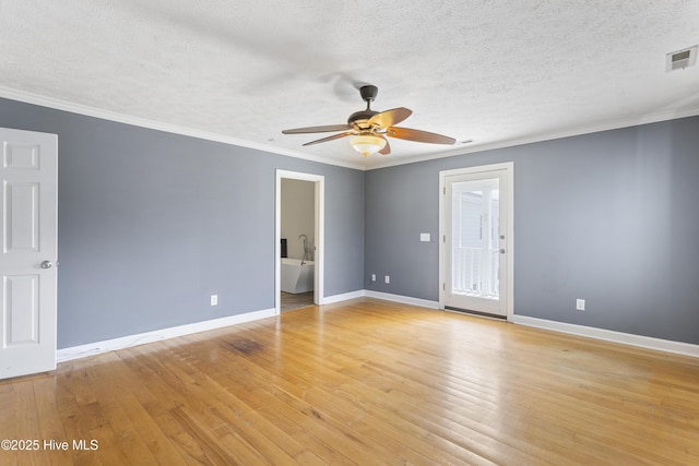 spare room with crown molding, ceiling fan, light hardwood / wood-style flooring, and a textured ceiling