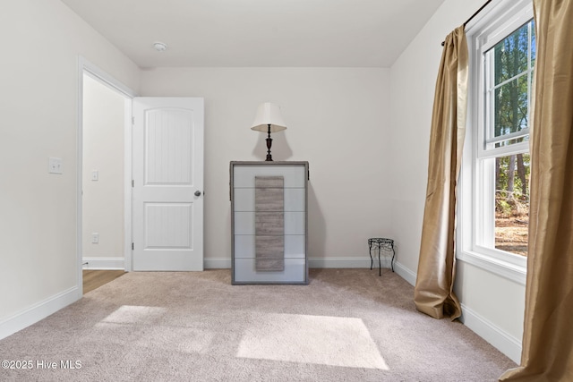 unfurnished bedroom featuring carpet