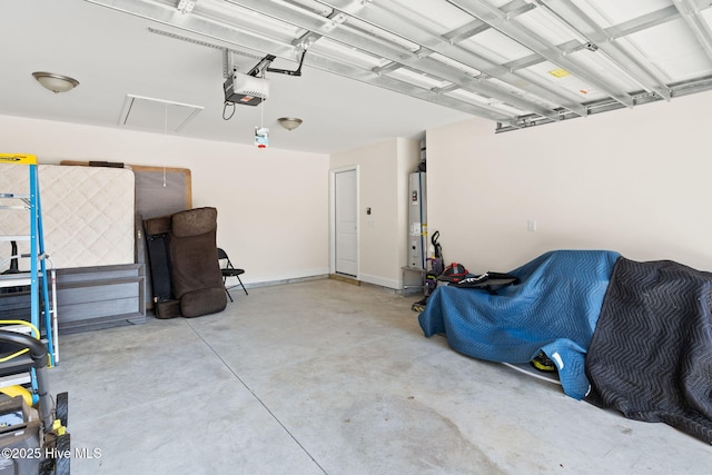 garage with a garage door opener and gas water heater