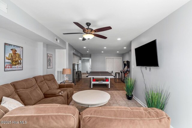 living room with ceiling fan