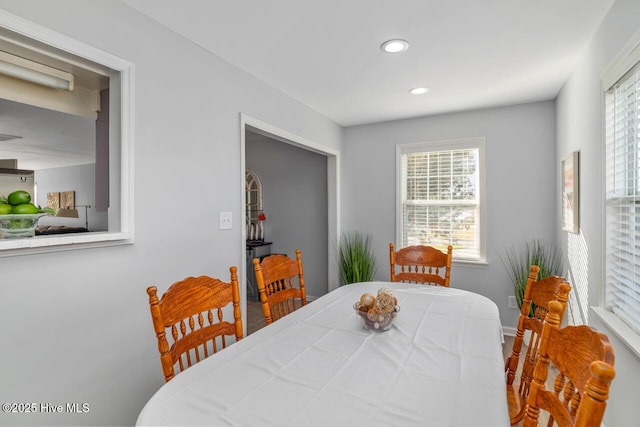 dining space featuring a healthy amount of sunlight