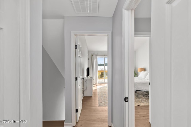 hallway featuring light wood-type flooring