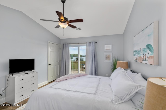 bedroom featuring ceiling fan, lofted ceiling, wood-type flooring, and access to outside