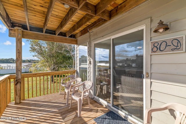 deck featuring a water view