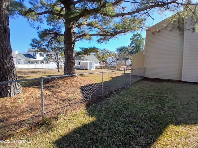 view of yard with a storage shed