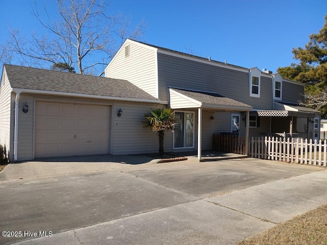 view of front of home with a garage