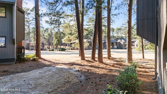 view of yard featuring a residential view