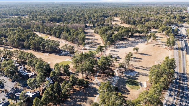 aerial view featuring a forest view