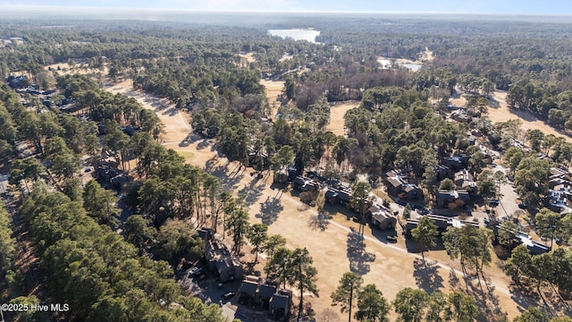 drone / aerial view with a forest view