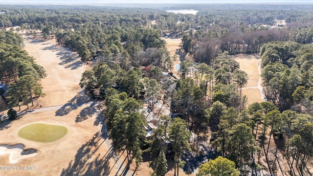 aerial view featuring a wooded view