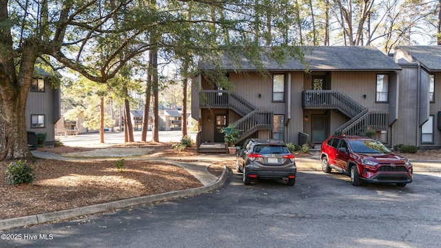 view of property featuring stairs