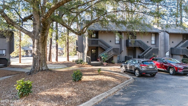 view of front of property featuring stairs