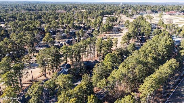 drone / aerial view with a forest view