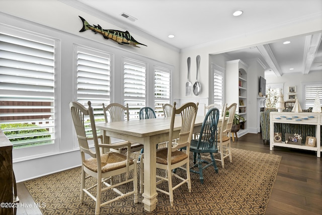 dining space featuring beam ceiling, dark wood-type flooring, and ornamental molding