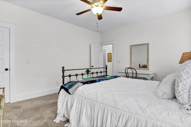 bedroom featuring light carpet and ceiling fan