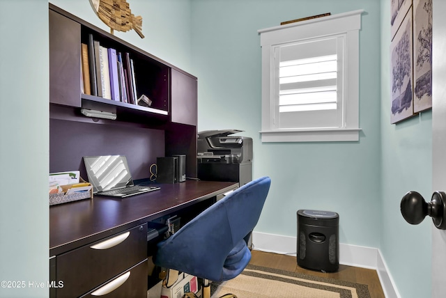 office space with dark hardwood / wood-style flooring