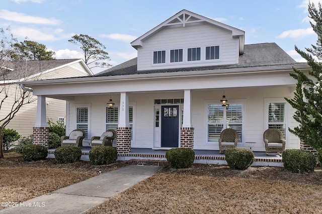 view of front of property featuring covered porch